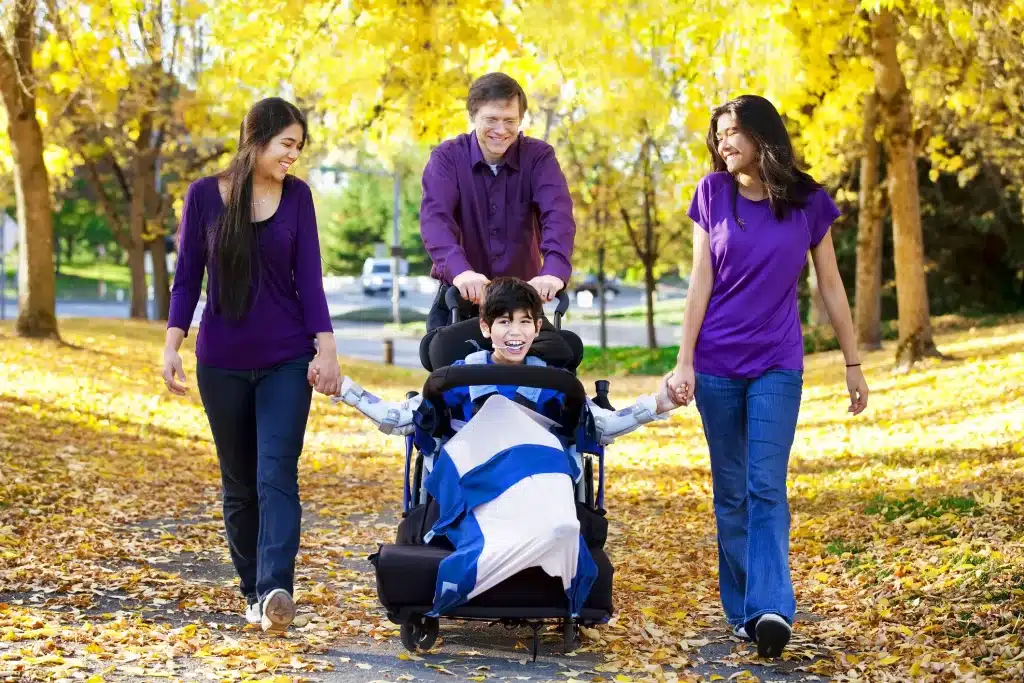 A family walking together in the park.
